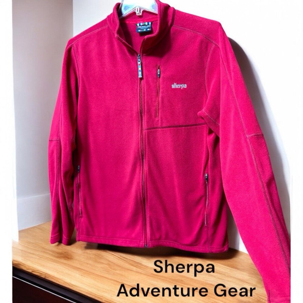 Sherpa Adventure Gear-men’s XL full zip fleece jacket. Red/3 pockets. Cinch cord